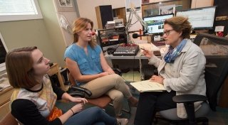 Students speaking with internship sponsor